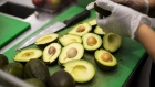 A worker prepares avocados inside a Sweetgreen Inc. restaurant in Boston, Massachusetts