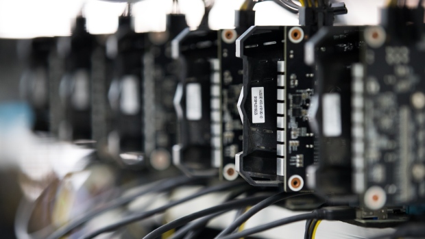 Circuit boards sit on shelves at a cryptocurrency mining facility in Incheon, South Korea, on Friday, Dec. 15, 2017. Hedge funds are pulling out of gold bets as more exciting moves in equities and cryptocurrencies make safe-haven investments look boring. 