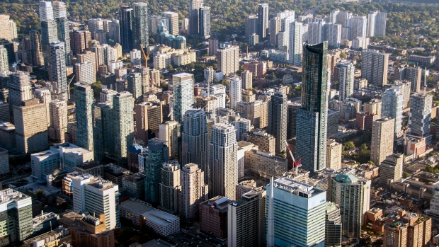 Buildings stand in the downtown skyline in this aerial photograph taken above Toronto, Ontario. 