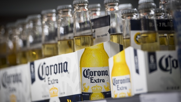 Bottles of Constellation Brands Inc. Corona beer sit on display for sale inside a BevMo Holdings LLC store in Walnut Creek, California, U.S., on Wednesday, Jan. 3, 2018. Constellation Brands Inc. is scheduled to release earnings figures on January 5. 