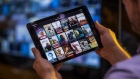 A selection of Netflix Inc. original content sits displayed in the Netflix app on an Apple Inc. iPad tablet device in this arranged photograph in London, U.K., on Monday, Aug. 20, 2018