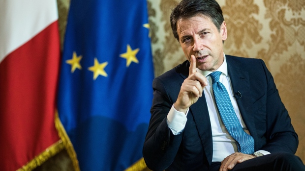 Giuseppe Conte, Italy's prime minister, gestures as he speaks during an interview at Chigi palace in Rome, Italy, on Tuesday, Oct. 23, 2018. Conte insisted his government has no "Plan B" to change its budget, despite the skeptical responses of the European Commission and investors. Photographer: Alessia Pierdomenico/Bloomberg