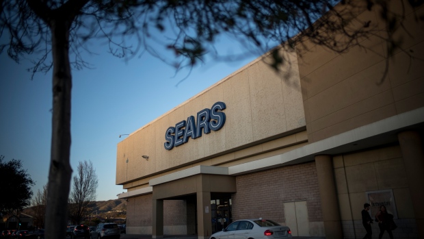 A vehicle sits parked outside of a Sears Holdings Corp. store in San Bruno, California, U.S., on Friday, Dec. 28, 2018. Sears got another chance at survival after Chairman Eddie Lampert put together a last-minute, last-ditch bid to buy the retailer out of bankruptcy. 