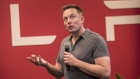 Elon Musk, chairman and chief executive officer of Tesla Motors, speaks during an event the company's headquarters in Palo Alto, California, U.S.