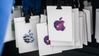 Apple Inc. logos are displayed on badges ahead of an event in the Brooklyn borough of New York, U.S., on Tuesday, Oct. 30, 2018. The iPad Pro update comes at an important time for the device, which hasn't been refreshed since mid-2017. While the tablet market is contracting overall, the iPad has been slowly regaining momentum thanks to new software and lower-priced models, but also because competitors like Amazon.com Inc. and Samsung Electronics Co. haven't wowed the market lately. 