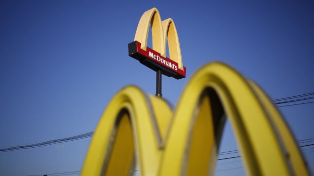 Signage is displayed outside a McDonald's Corp. fast food restaurant in Louisville, Kentucky, U.S. 