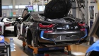 A BMW i8 hybrid electrical automobile stands on an assembly line trolley at the Bayerische Motoren Werke AG factory in Leipzig, Germany. 
