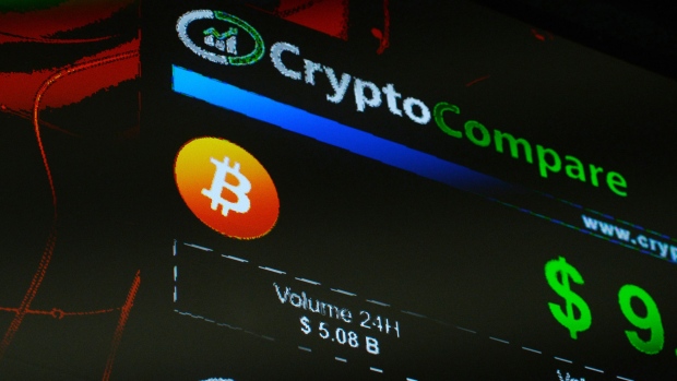 The symbols of Bitcoin and Ethereum cryptocurrencies sit displayed on a screen during the Crypto Investor Show in London, U.K., on Saturday, March 10, 2018. The meeting is the largest crypto and blockchain event for investors in the U.K. 