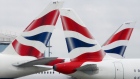 Tail fins sit on passenger aircraft, operated by British Airways. 