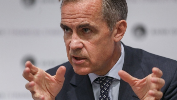 Mark Carney, governor of the Bank of England (BOE), gestures during a news conference following the publication of the Financial Stability Report at the central bank in the City of London, U.K., on Thursday, July 11, 2019. 