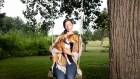Dog trainer Kelsey Brown and her 16-year-old basenji named Dingo.