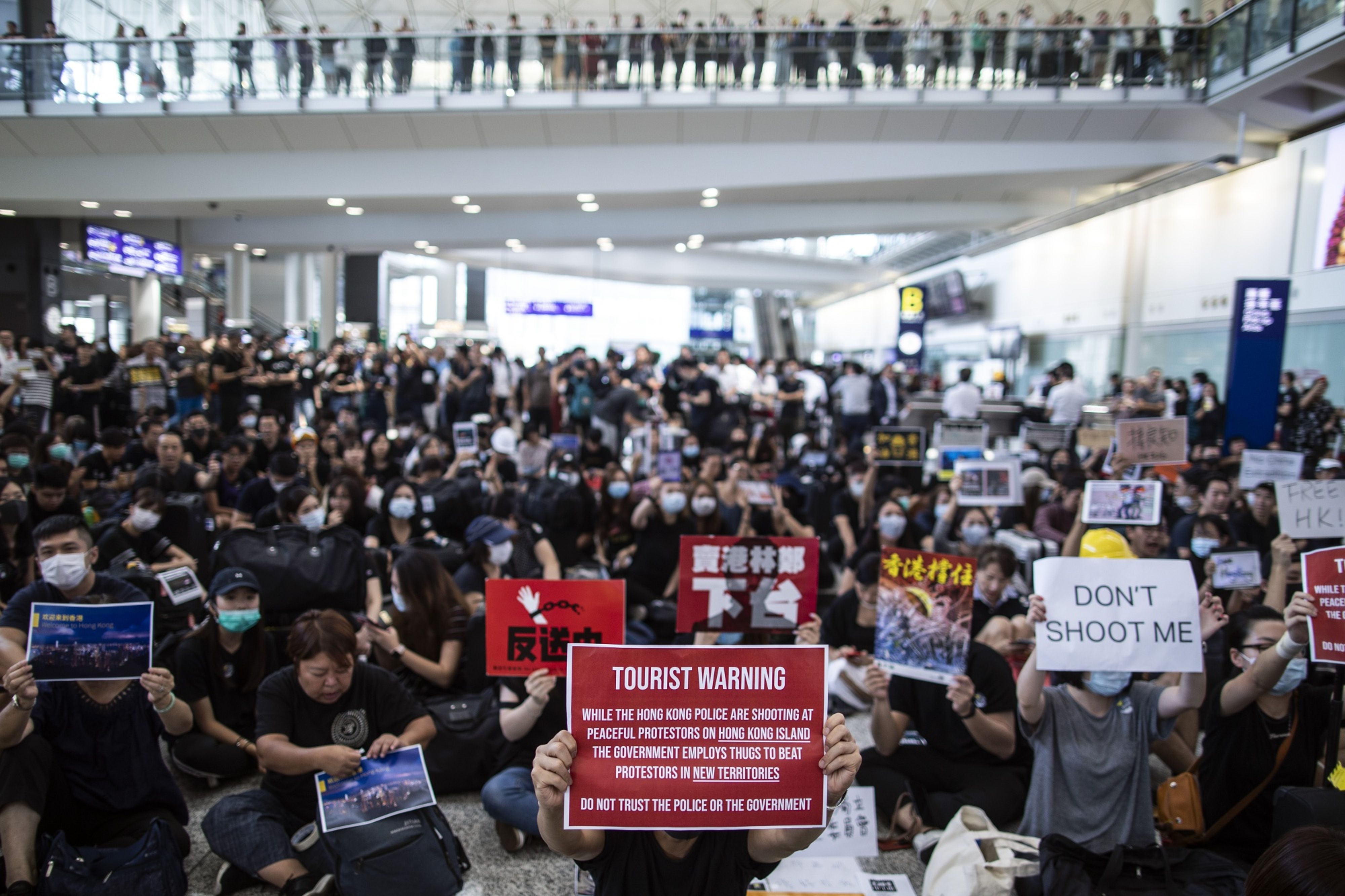 Anti-extradition bill protesters chanting ‘free Hong Kong’ summon on airport
