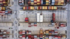 Shipping containers sit stacked at the Yangshan Deepwater Port, operated by Shanghai International Port Group Co. (SIPG), in this aerial photograph taken in Shanghai, China, on Friday, May 10, 2019. 