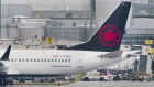 An Air Canada Boeing 737 Max 8 aircraft is shown next to a gate at Trudeau Airport in Montreal on Ma