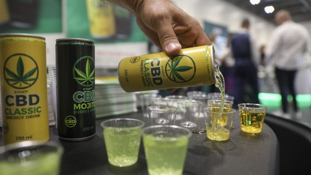 A can of E-fast energy drink is poured at the CBD Hive stand at the Europe CBD Expo at the Excel in London, U.K., on Friday, Jul. 12, 2019. U.K. investors eager for a piece of the cannabis market are being deterred by a broad, catch-all law on proceeds from criminal activities. 