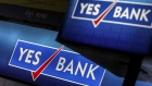 Signage for Yes Bank Ltd. is displayed at a branch in Mumbai, India, on Tuesday, April 30, 2018.
