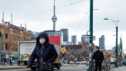 A pedestrian wears a protective mask in Toronto on Monday, January 27, 2020. The Canadian Press