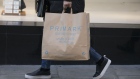 A pedestrian carries a shopping bag from a Primark clothing store, operated by Associated British Foods Plc, in London, U.K., on Monday, Feb. 10, 2020. European retailers are likely to see coronavirus fallout spread from Chinese retail sales to supply chains, causing disruptions globally and affecting profit, according to Bloomberg Intelligence. Photographer: Jason Alden/Bloomberg