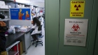 A researcher works in a lab that is developing testing for the COVID-19 coronavirus at Hackensack Meridian Health Center for Discovery and Innovation in Nutley, New Jersey on Feb. 28. Photographer: Kena Betancur/Getty Images