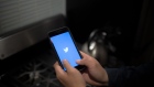 The Twitter Inc. logo is displayed on an Apple Inc. iPhone in this arranged photograph taken in the Brooklyn Borough of New York, U.S., on Monday, April 23, 2018. Twitter Inc. is scheduled to release earnings figure on April 25. Photographer: Alex FLynn/Bloomberg