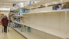Empty shelves stand in the toilet paper aisle at a J Sainsbury Plc supermarket in Exeter, U.K. on March 6. Photographer: Luke MacGregor/Bloomberg