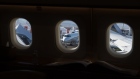 Planes are seen through the windows of an Airbus ACJ319neo private during the National Business Aviation Association Annual Convention in Henderson, Nevada, U.S., on Monday, Oct. 21, 2019. 