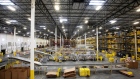 Employees fufill online orders at the Amazon.com Inc. fulfillment center in Robbinsville, New Jersey. Photographer: Bess Adler/Bloomberg