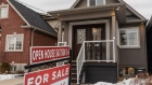 A "For Sale" sign stands in front of a house in Toronto, Ontario, Canada, on Saturday, Feb. 15, 2020. A shrinking supply of available homes for sale in Canada's largest city continued to drive prices higher last month, bringing annual increases to the strongest in more than two years. Photographer: Brett Gundlock/Bloomberg