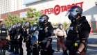 Minnesota State Police protect a Target Store Thursday, May 28, 2020, in St. Paul, Minn. 