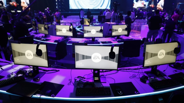 The Electronic Arts Inc. (EA) logo is displayed on computer monitors during the company's EA Play event ahead of the E3 Electronic Entertainment Expo in Los Angeles, California, U.S., on Saturday, June 9, 2018. EA announced that it is introducing a higher-end version of its subscription game-playing service that will include new titles such as Battlefield V and the Madden NFL 19 football game. Photographer: Patrick T. Fallon/Bloomberg