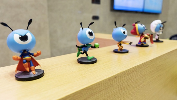 Various figurines of the mascot for Ant Financial are displayed on a reception desk in the lobby of the company's headquarters in Hangzhou, China, on Thursday, Oct. 17, 2019. Ant, the Chinese online finance giant controlled by billionaire Jack Ma, continues to see strong credit demand among small and mid-sized enterprises despite a cooling economy. Photographer: Qilai Shen/Bloomberg