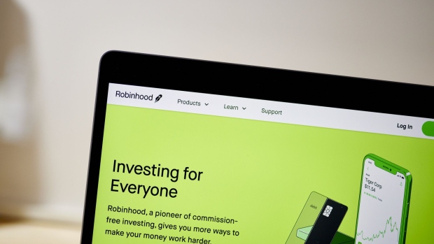 The website home screen for Robinhood is displayed on a laptop computer.