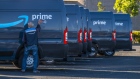 A contractor working for Amazon.com cleans a delivery truck in Richmond, California, U.S., on Tuesday, Oct. 13, 2020. Amazon.com Inc.'s two-day Prime Day sale kicks off on Tuesday and is expected to give the world's largest e-commerce company an early advantage over brick-and-mortar rivals still contending with pandemic-spooked consumers wary of battling Black Friday crowds. Photographer: David Paul Morris/Bloomberg