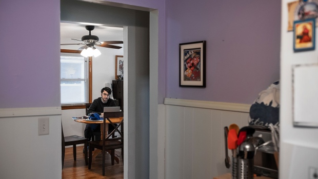 Nicholas Croce, a graduate student in Syracuse, New York, was one of thousands of remote workers hired by the SBA to tackle the surge in loan applications.  Photographer: Misha Friedman/Bloomberg