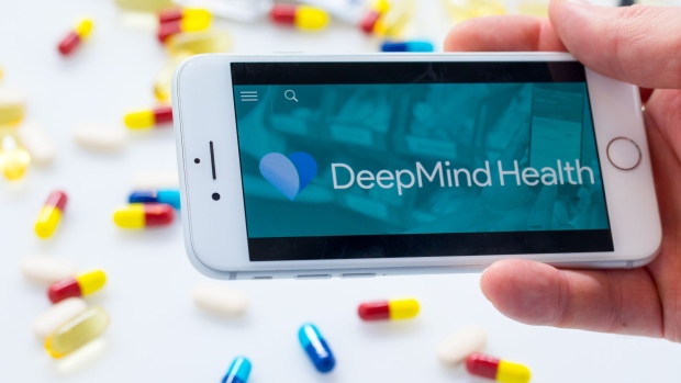 A Deepmind Health logo sits displayed on the screen of an Apple Inc. iPhone in this arranged photograph in London, U.K. on Monday, Nov. 26, 2018.