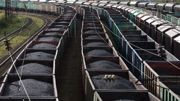Freight wagons filled with coal line the railways tracks at the Port of Murmansk, in Murmansk, Russia, on Saturday, Sept. 14, 2019. Crude and condensate shipments from Russia’s Arctic terminals are shipped in dedicated shuttle tankers to the Russian port of Murmansk where they are trans-shipped onto larger vessels for export. Photographer: Andrey Rudakov/Bloomberg