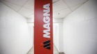 Magna International Inc. signage sits on display inside the company's Polycon Industries auto parts manufacturing facility in Guelph, Ontario, Canada, on Thursday, Aug. 30, 2018. Canadian stocks and the dollar extended gains Monday on news of a U.S.-Mexican trade agreement, shrugging off U.S. President Donald Trump's threats that Canada might be frozen out and instead face auto tariffs. 