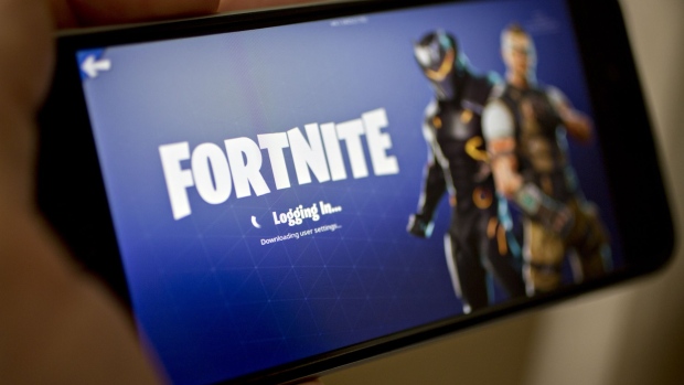 The Epic Games Inc. Fortnite: Battle Royale video game is displayed for a photograph on an Apple Inc. iPhone in Washington, D.C., U.S., on Thursday, May 10, 2018.