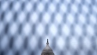 Temporary security fencing surrounds the U.S. Capitol in Washington, D.C., U.S., on Wednesday, Feb. 10, 2021. House Democrats used searing video footage from last month’s deadly rampage at the U.S. Capitol to begin Donald Trump’s second impeachment trial on a dramatic note, yet the prosecution remains far from winning enough GOP votes to convict the former president. Photographer: Stefani Reynolds/Bloomberg