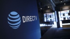 AT&T Inc. and DirecTV signage is displayed at a store in Newport Beach, California, U.S., on Thursday, Aug. 10, 2017. AT&T Inc. shares surged the most in more than eight years after the telecommunications giant posted a surprise wireless subscriber gain in the second quarter, showing it can fend for itself in a cutthroat price war. An offer for unlimited wireless data, bundled with discounted streaming-TV service, helping AT&T bide its time while awaiting regulatory approval to transform into a media powerhouse through the $85.4 billion purchase of Time Warner Inc.