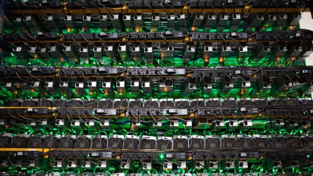 Cryptocurrency mining rigs sit on racks at a Bitfarms facility in Saint-Hyacinthe, Quebec, Canada, on Thursday, July 26, 2018. Bitcoin has rallied more than 30 percent in July, shrugging off security and regulatory concerns that have plagued the virtual currency for much of this year. Photographer: James MacDonald/Bloomberg