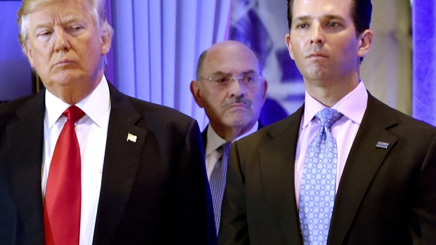 us-president-elect-donald-trump-along-with-his-son-donald-jr-arrive-for-a-press-conference-at-trump-tower-in-new-york-as-allen-weisselberg-c-chief-financial-officer-of-the-trump-looks-on.jpg