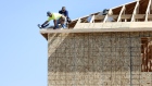 Contractors frame the roof of a home under construction in Park City, Utah, U.S., on Friday, Aug. 14, 2020. U.S. home construction starts rose 17% in June, with builders ramping up production as lockdowns eased. Photographer: George Frey/Bloomberg