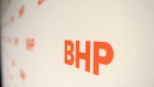 The BHP Billiton Ltd. logo is displayed at the company's annual general meeting in Melbourne, Australia, on Thursday, Nov. 16, 2017. BHP is aiming to complete its exit from the U.S. onshore oil and gas sector within two years after settling on asset sales ahead of alternatives such as an initial public offering. Photographer: Carla Gottgens/Bloomberg