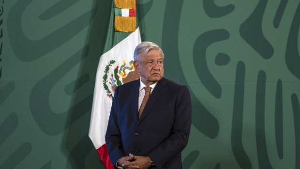 Andres Manuel Lopez Obrador, Mexico's president, listens during a news conference in Mexico City, Mexico, on Monday, April 19, 2021. Mexico's president will propose a regional agreement on migration to the U.S. this week and the expansion of his tree planting program to Central America as an option to provide order in the process of seeking entry to the U.S.
