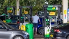 A customer uses a fuel pump at BP Plc petrol station near Guildford, U.K., on Monday, Sept. 27, 2021. The U.K. government took emergency measures late Sunday to try to ease acute fuel shortages across the country, as gasoline retailers shut pumps after days of panic buying.