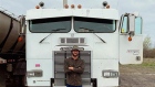 Watson McGlashan is seen standing in front of his truck