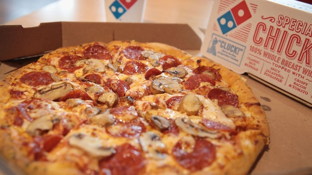 Domino’s Pizza Group surges most ever on franchisee resolution