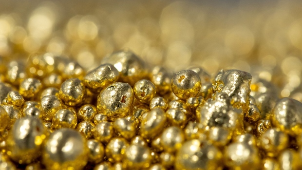 Gold steady as investors weigh policy outlook against omicron
