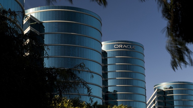 Oracle falls after profit misses estimates, apps growth slows